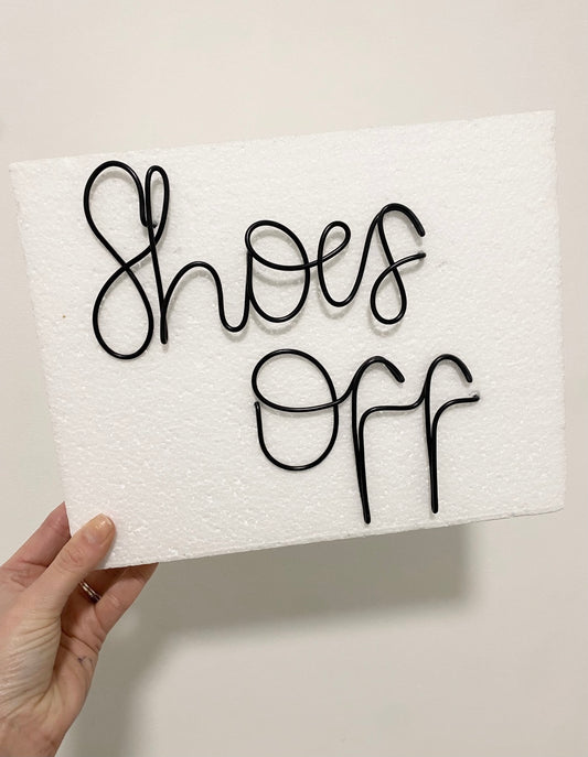 'Shoes Off' wire sign